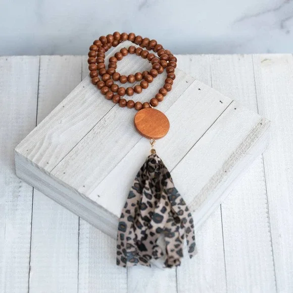 Lauren Lane Jewelry Cheetah Print Tassel Wooden Bead Necklace